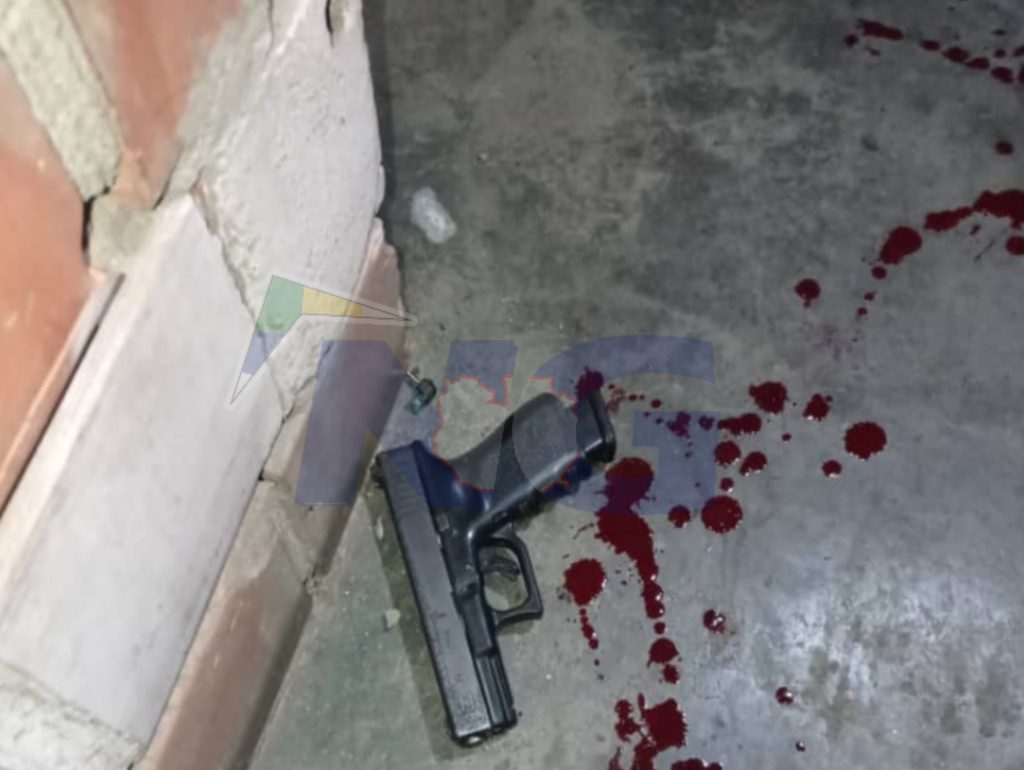 Arma 9mm solicitada, la cual fue colectada en el sitio